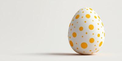 Colorful polka dot egg stands prominently against a light background in a creative design setting photo