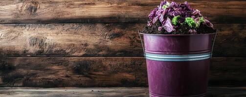 Urban composting bin with organic waste and fresh greens photo