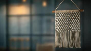 Handcrafted macrame wall hanging with woven textures and fringes photo