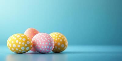 Colorful polka dot eggs arranged on a blue background for spring celebrations or Easter festivities photo