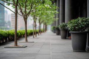 Lush trees and greenery line modern urban walkway, creating serene atmosphere photo