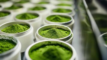 Vibrant green matcha powder in white containers, showcasing its rich color and texture. Perfect for culinary and health uses photo