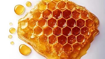 Honeycomb with flowing honey syrup isolated on white background Flat Lay photo