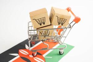 Online shopping, Shopping cart box on Sudan flag, import export, finance c photo
