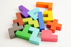 Logical thinking and problem solving problem solution creative business, wooden puzzle geometric photo