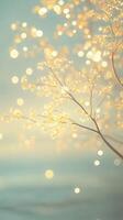 Delicate, bare branches reach out against a background of shimmering golden creating a serene and magical atmosphere glittery and shiny, soft focus photo