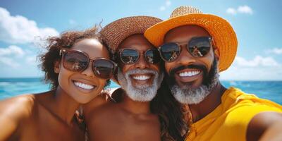 Smiling friends enjoy a sunny beach day together with bright blue sea and sky in the background photo