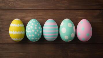 Decorative easter eggs display on wooden table colorful art festive atmosphere top view spring celebration photo
