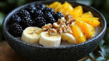 A bowl of fruit and nuts in a bowl photo