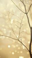 Delicate, bare branches reach out shimmering golden bokeh, creating a serene and magical atmosphere glittery and shiny, soft focus photo