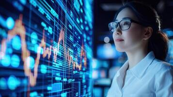 Professional female analyzing financial data on interactive digital screen, analytics in contemporary workspace trading chart photo