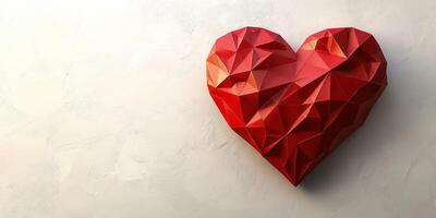 Decorative red heart sculpture on a light textured background showcasing geometric design photo