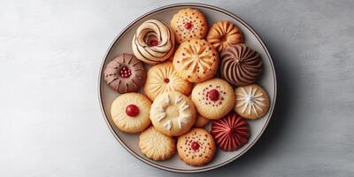 Delicious assortment of homemade cookies arranged beautifully on a plate ready for dessert or celebration photo