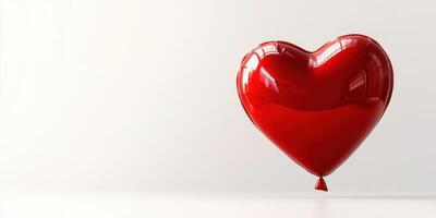 Heart-shaped red balloon floating against a neutral background, symbolizing love and celebration photo