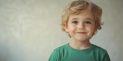 Young child with curly blonde hair smiles warmly against a light background in a playful indoor setting photo