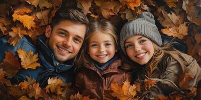 Family enjoys autumn fun while lying on colorful leaves in a park during a sunny day photo