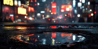 Urban street at night with reflections in a puddle amidst vibrant city lights and rain-soaked pavement photo