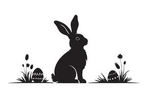 Easter bunny silhouette in the grass with eggs vector