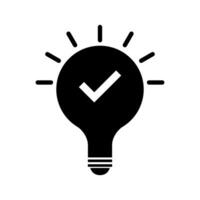 A black light bulb with a tick mark on it vector