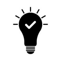 Light bulb icon with tick mark on white background vector