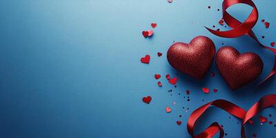 Decorative hearts and ribbons create a festive atmosphere on a blue background for a celebration photo