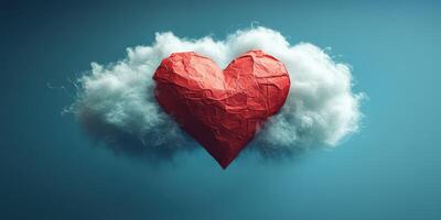 Heart-shaped paper art resting on a fluffy cloud against a serene blue background photo