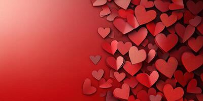 Colorful red heart shapes scattered on a gradient background creating a warm atmosphere of love and affection photo