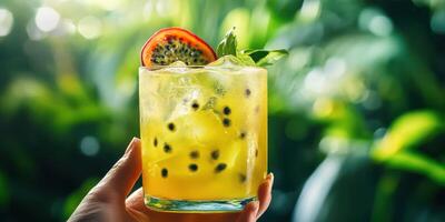 Refreshing tropical drink served in a glass with fresh ingredients in a lush garden setting photo
