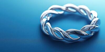 Elegant silver twisted bangle on a blue background showcasing modern jewelry design and craftsmanship photo