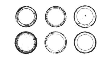 Vintage grunge stamps with distressed round shapes creating a worn and retro textured design vector