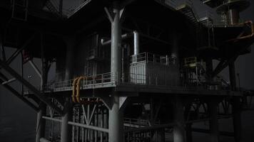 An offshore oil rig with towering pipes and structures video