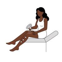 A woman is getting a massage with a device vector