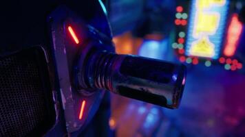 A close up of a metal object with neon lights in the background video