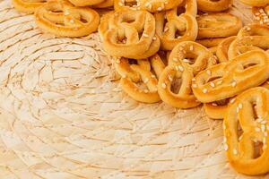 Delicious pretzels beautifully arranged on a woven platter photo