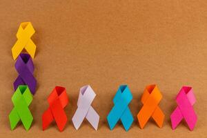 Diverse colorful awareness ribbons representing various health campaigns photo