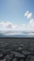 ocean seascape with sky and ocean wave splitted by waterline to underwater part video