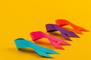 Ribbons of hope represent cancer awareness and support for various causes photo