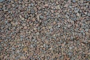 Processed collage of sea shore pebbles texture. Background for banner, backdrop or texture for 3D mapping photo