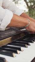 Hands Of A Boy Play The Keyboard Backwards In The Nature video