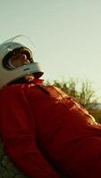 Exhausted Astronaut Collapses On A Rock With Helmet On An Empty Planet video