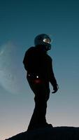 Silhouette Of An Astronaut Explores The Mountain Of An Abandoned Hostile Planet video