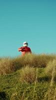 Astronaut Looks Out From The Mountain And Asks For Help Gesturing For Rescue video