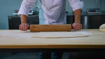 Chef Rolling Flat Dough on Counter video