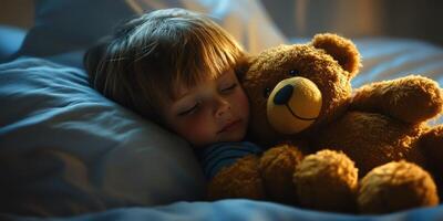 Child peacefully sleeping with teddy bear in cozy bedroom at night under soft warm light photo