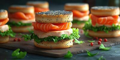 Freshly prepared seafood sandwiches stacked high with lettuce on a wooden serving board photo