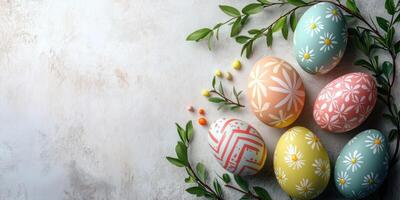 Decorative Easter eggs arranged with green foliage for a festive spring celebration photo