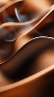 Luxurious fabric showcasing elegant waves and textures in warm brown tones during soft lighting conditions photo