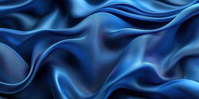 Deep blue silk fabric draped elegantly creating soft waves and textures under gentle lighting photo