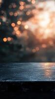 Evening light reflected on a wet surface with a blurred background of bokeh lights in a tranquil setting photo