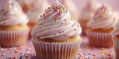 Colorful cupcakes with creamy frosting and sprinkles perfect for a celebration or dessert table display photo